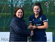 13 April 2023; Aine Naughton is presented with her winners medal by Vice President of Hockey Ireland Barbara O'Malley during the UCD Ladies Hockey EYHL medal presentation event at UCD Hockey Stadium in Belfield, Dublin. Photo by Tyler Miller/Sportsfile