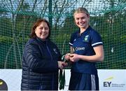 13 April 2023; Kate Ryan is presented with her winners medal by Vice President of Hockey Ireland Barbara O'Malley during the UCD Ladies Hockey EYHL medal presentation event at UCD Hockey Stadium in Belfield, Dublin. Photo by Tyler Miller/Sportsfile