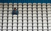 14 April 2023; A supporter in the stand before the SSE Airtricity Men's First Division match between Waterford and Kerry at the RSC in Waterford. Photo by Michael P Ryan/Sportsfile