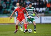 14 April 2023; Jonathan Lunney of Shelbourne in action against Sean Kavanagh of Shamrock Rovers during the SSE Airtricity Men's Premier Division match between Shamrock Rovers and Shelbourne at Tallaght Stadium in Dublin. Photo by Seb Daly/Sportsfile