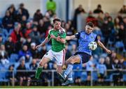 14 April 2023; Adam Wells of UCD in action against Cian Murphy of Cork City during the SSE Airtricity Men's Premier Division match between UCD and Cork City at UCD Bowl in Dublin. Photo by Stephen Marken/Sportsfile