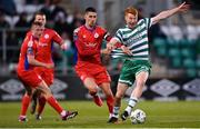 14 April 2023; Graham Burke of Shamrock Rovers in action against Shane Griffin of Shelbourne during the SSE Airtricity Men's Premier Division match between Shamrock Rovers and Shelbourne at Tallaght Stadium in Dublin. Photo by Seb Daly/Sportsfile