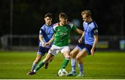 14 April 2023; Joseph O’Brien-Whitmarsh of Cork City in action against Dara Keane, left and Mark Dignam of UCD during the SSE Airtricity Men's Premier Division match between UCD and Cork City at UCD Bowl in Dublin. Photo by Stephen Marken/Sportsfile