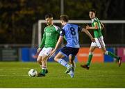 14 April 2023; Aaron Bolger of Cork City in action against Mark Dignam of UCD during the SSE Airtricity Men's Premier Division match between UCD and Cork City at UCD Bowl in Dublin. Photo by Stephen Marken/Sportsfile