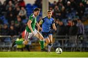 14 April 2023; Cian Murphy of Cork City in action against Jack Keaney of UCD during the SSE Airtricity Men's Premier Division match between UCD and Cork City at UCD Bowl in Dublin. Photo by Stephen Marken/Sportsfile