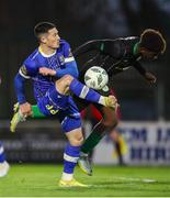 14 April 2023; Ronan Coughlan of Waterford in action against Samuel Aladesanusi of Kerry FC during the SSE Airtricity Men's First Division match between Waterford and Kerry at the RSC in Waterford. Photo by Michael P Ryan/Sportsfile