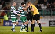 14 April 2023; Richie Towell of Shamrock Rovers assists Shelbourne goalkeeper Conor Kearns during the SSE Airtricity Men's Premier Division match between Shamrock Rovers and Shelbourne at Tallaght Stadium in Dublin. Photo by Seb Daly/Sportsfile