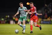 14 April 2023; Sean Hoare of Shamrock Rovers in action against Kameron Ledwidge of Shelbourne during the SSE Airtricity Men's Premier Division match between Shamrock Rovers and Shelbourne at Tallaght Stadium in Dublin. Photo by Seb Daly/Sportsfile