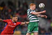 14 April 2023; Rory Gaffney of Shamrock Rovers in action against Paddy Barrett of Shelbourne during the SSE Airtricity Men's Premier Division match between Shamrock Rovers and Shelbourne at Tallaght Stadium in Dublin. Photo by Seb Daly/Sportsfile