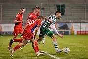 14 April 2023; Neil Farrugia of Shamrock Rovers in action against Kameron Ledwidge of Shelbourne during the SSE Airtricity Men's Premier Division match between Shamrock Rovers and Shelbourne at Tallaght Stadium in Dublin. Photo by Seb Daly/Sportsfile