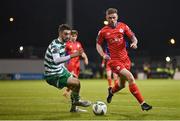 14 April 2023; Kameron Ledwidge of Shelbourne in action against Neil Farrugia of Shamrock Rovers during the SSE Airtricity Men's Premier Division match between Shamrock Rovers and Shelbourne at Tallaght Stadium in Dublin. Photo by Seb Daly/Sportsfile