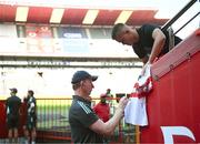 15 April 2023; Leinster head coach Leo Cullen signs a jersey before the United Rugby Championship match between Emirates Lions and Leinster at Emirates Airlines Park in Johannesburg, South Africa. Photo by Harry Murphy/Sportsfile
