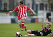15 April 2023; Adam Deans of St Joseph’s in action against Rian O’Riordan of College Corinthians during the FAI Youth Cup Final match between St Joseph’s AFC, Dublin, and College Corinthians AFC, Cork, at the Carlisle Grounds in Bray, Wicklow. Photo by Seb Daly/Sportsfile