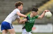 15 April 2023; Oisin Swift of of Fermanagh in action against Tommy Mallen of Monaghan during the Electric Ireland Ulster GAA Football Minor Championship Round 1 match between Fermanagh and Monaghan at Brewster Park in Enniskillen, Fermanagh. Photo by Ramsey Cardy/Sportsfile