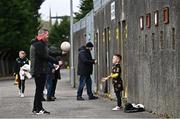 15 April 2023; Derry supporters Stephen Mackey, and his son Harry, age 6, from Drumsurn, before the Ulster GAA Football Senior Championship Quarter-Final match between Fermanagh and Derry at Brewster Park in Enniskillen, Fermanagh. Photo by Ramsey Cardy/Sportsfile