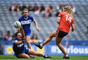 15 April 2023; Kelly Mallon of Armagh has her shot blocked  by Clodagh Dunne of Laois during the Lidl Ladies Football National League Division 2 Final match between Armagh and Laois at Croke Park in Dublin. Photo by Sam Barnes/Sportsfile