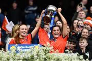 15 April 2023; Armagh players and sisters Blaithín Mackin, left, and Aimee Mackin, right, lift the cup with nephew Eoin Shannon, aged 4, after their side's victory in the Lidl Ladies Football National League Division 2 Final match between Armagh and Laois at Croke Park in Dublin. Photo by Sam Barnes/Sportsfile