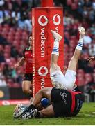 15 April 2023; Chris Cosgrave of Leinster scores his side's fifth try despite the tackle of Morne Brandon of Emirates Lions during the United Rugby Championship match between Emirates Lions and Leinster at Emirates Airlines Park in Johannesburg, South Africa. Photo by Harry Murphy/Sportsfile