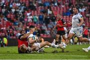 15 April 2023; Chris Cosgrave of Leinster on his way to scoring his side's fifth try despite the tackle of Morne Brandon of Emirates Lions during the United Rugby Championship match between Emirates Lions and Leinster at Emirates Airlines Park in Johannesburg, South Africa. Photo by Harry Murphy/Sportsfile