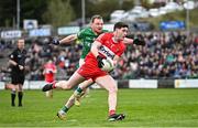 15 April 2023; Padraig McGrogan of Derry in action against Aidan Breen of Fermanagh during the Ulster GAA Football Senior Championship Quarter-Final match between Fermanagh and Derry at Brewster Park in Enniskillen, Fermanagh. Photo by Ramsey Cardy/Sportsfile