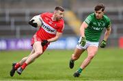 15 April 2023; Niall Loughlin of Derry in action against Jonathan Cassidy of Fermanagh during the Ulster GAA Football Senior Championship Quarter-Final match between Fermanagh and Derry at Brewster Park in Enniskillen, Fermanagh. Photo by Ramsey Cardy/Sportsfile
