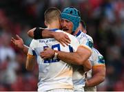 15 April 2023; Sam Prendergast of Leinster is embraced by teammates Will Connors and Ed Byrne after kicking a penalty to win the United Rugby Championship match between Emirates Lions and Leinster at Emirates Airlines Park in Johannesburg, South Africa. Photo by Harry Murphy/Sportsfile