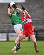 15 April 2023; Darragh McGurn of Fermanagh in action against Eoghan McEvoy of Derry during the Ulster GAA Football Senior Championship Quarter-Final match between Fermanagh and Derry at Brewster Park in Enniskillen, Fermanagh. Photo by Ramsey Cardy/Sportsfile