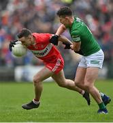 15 April 2023; Niall Toner of Derry in action against Shane McGullion of Fermanagh during the Ulster GAA Football Senior Championship Quarter-Final match between Fermanagh and Derry at Brewster Park in Enniskillen, Fermanagh. Photo by Ramsey Cardy/Sportsfile