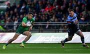 15 April 2023; Tiernan O'Halloran of Connacht in action against Owen Lane of Cardiff during the United Rugby Championship match between Connacht and Cardiff at Sportsground in Galway. Photo by Tyler Miller/Sportsfile