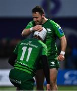 15 April 2023; Mack Hansen of Connacht is congratulated by teammate Caolin Blade after scoring his side's fourth try during the United Rugby Championship match between Connacht and Cardiff at Sportsground in Galway. Photo by Tyler Miller/Sportsfile