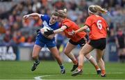 15 April 2023; Laura-Marie Maher of Laois in action against Shauna Grey and Lauren McConville of Armagh during the Lidl Ladies Football National League Division 2 Final match between Armagh and Laois at Croke Park in Dublin. Photo by Brendan Moran/Sportsfile
