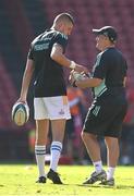 15 April 2023; Sam Prendergast of Leinster and Leinster academy manager Simon Broughton during the United Rugby Championship match between Emirates Lions and Leinster at Emirates Airlines Park in Johannesburg, South Africa. Photo by Harry Murphy/Sportsfile