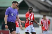 15 April 2023; Aji Habeeb of St Joseph’s remonstrates with referee Alan Franklin during the FAI Youth Cup Final match between St Joseph’s AFC, Dublin, and College Corinthians AFC, Cork, at the Carlisle Grounds in Bray, Wicklow. Photo by Seb Daly/Sportsfile
