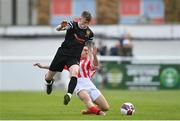 15 April 2023; Harry Quilligan of College Corinthians in action against Alan Seruga of St Joseph’s during the FAI Youth Cup Final match between St Joseph’s AFC, Dublin, and College Corinthians AFC, Cork, at the Carlisle Grounds in Bray, Wicklow. Photo by Seb Daly/Sportsfile