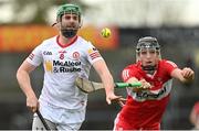 16 April 2023; Chris Kearns of Tyrone in action against James Friel of Derry during the Christy Ring Cup Round One match between Tyrone and Derry at O'Neill's Healy Park in Omagh, Tyrone. Photo by Ramsey Cardy/Sportsfile