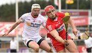 16 April 2023; John Mullan of Derry in action against Dean Rafferty of Tyrone during the Christy Ring Cup Round One match between Tyrone and Derry at O'Neill's Healy Park in Omagh, Tyrone. Photo by Ramsey Cardy/Sportsfile