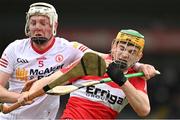 16 April 2023; Ségdae Melaugh of Derry in action against Dean Rafferty of Tyrone during the Christy Ring Cup Round One match between Tyrone and Derry at O'Neill's Healy Park in Omagh, Tyrone. Photo by Ramsey Cardy/Sportsfile