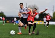 16 April 2023; John Martin of Dundalk in action against Ronan Boyce of Derry City during the SSE Airtricity Men's Premier Division match between Dundalk and Derry City at Oriel Park in Dundalk, Louth. Photo by Ben McShane/Sportsfile