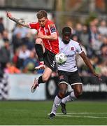 16 April 2023; Jamie McGonigle of Derry City in action against Wasiri Williams of Dundalk during the SSE Airtricity Men's Premier Division match between Dundalk and Derry City at Oriel Park in Dundalk, Louth. Photo by Ben McShane/Sportsfile