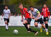 16 April 2023; Ronan Boyce of Derry City in action against Robbie Benson of Dundalk during the SSE Airtricity Men's Premier Division match between Dundalk and Derry City at Oriel Park in Dundalk, Louth. Photo by Ben McShane/Sportsfile