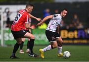 16 April 2023; Robbie Benson of Dundalk in action against Shane McEleney of Derry City during the SSE Airtricity Men's Premier Division match between Dundalk and Derry City at Oriel Park in Dundalk, Louth. Photo by Ben McShane/Sportsfile