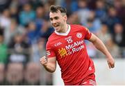 16 April 2023; Darragh Canavan of Tyrone celebrates after scoring his side's first goal during the Ulster GAA Football Senior Championship Quarter-Final match between Tyrone and Monaghan at O'Neill's Healy Park in Omagh, Tyrone. Photo by Ramsey Cardy/Sportsfile