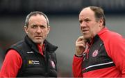 16 April 2023; Tyrone joint-managers Brian Dooher, left, and Feargal Logan during the Ulster GAA Football Senior Championship Quarter-Final match between Tyrone and Monaghan at O'Neill's Healy Park in Omagh, Tyrone. Photo by Ramsey Cardy/Sportsfile