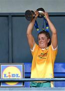 16 April 2023; Antrim captain Cathy Carey lifts the cup after her side's victory in the 2023 Lidl Ladies National Football League Division 4 Final match between Antrim and Leitrim at Parnell Park in Dublin. Photo by Piaras Ó Mídheach/Sportsfile