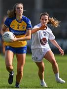 16 April 2023; Aisling Reidy of Clare in action against Claire Sullivan of Kildare during the 2023 Lidl Ladies National Football League Division 3 Final match between Clare and Kildare at Parnell Park in Dublin. Photo by Piaras Ó Mídheach/Sportsfile
