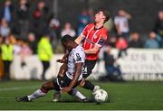 16 April 2023; Ollie O'Neill of Derry City is tackled by Wasiri Williams of Dundalk, resulting in a red card, during the SSE Airtricity Men's Premier Division match between Dundalk and Derry City at Oriel Park in Dundalk, Louth. Photo by Ben McShane/Sportsfile