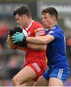 16 April 2023; Darren McCurry of Tyrone in action against Shane Carey of Monaghan during the Ulster GAA Football Senior Championship Quarter-Final match between Tyrone and Monaghan at O'Neill's Healy Park in Omagh, Tyrone. Photo by Ramsey Cardy/Sportsfile