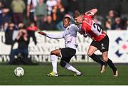16 April 2023; Rayhaan Tulloch of Dundalk in action against Ronan Boyce of Derry City during the SSE Airtricity Men's Premier Division match between Dundalk and Derry City at Oriel Park in Dundalk, Louth. Photo by Ben McShane/Sportsfile