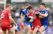 16 April 2023; Darren McCurry of Tyrone in action against Shane Carey of Monaghan during the Ulster GAA Football Senior Championship Quarter-Final match between Tyrone and Monaghan at O'Neill's Healy Park in Omagh, Tyrone. Photo by Ramsey Cardy/Sportsfile