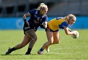 16 April 2023; Lizzy Roche of Clare in action against Kildare goalkeeper Mary Hulgraine during the 2023 Lidl Ladies National Football League Division 3 Final match between Clare and Kildare at Parnell Park in Dublin. Photo by Piaras Ó Mídheach/Sportsfile
